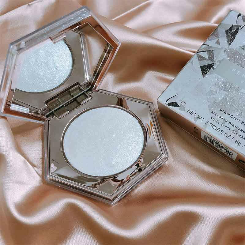 Fenty beauty diamond bomb high gloss powder.