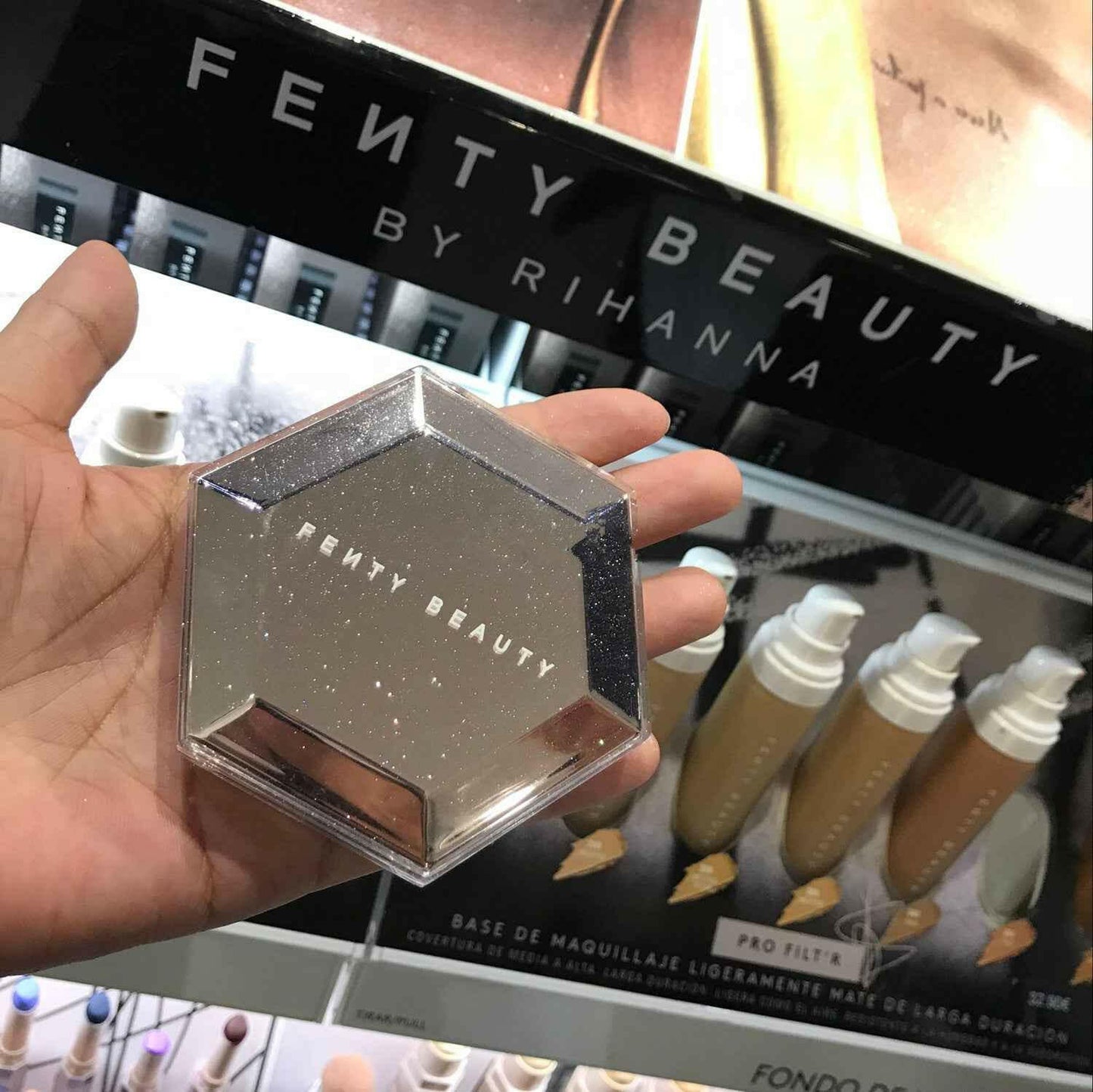 Fenty beauty diamond bomb high gloss powder.