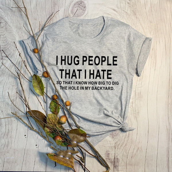"I Hug People I Hate" Grunge Graphic T-Shirt – Casual Statement Tee for Men & Women.