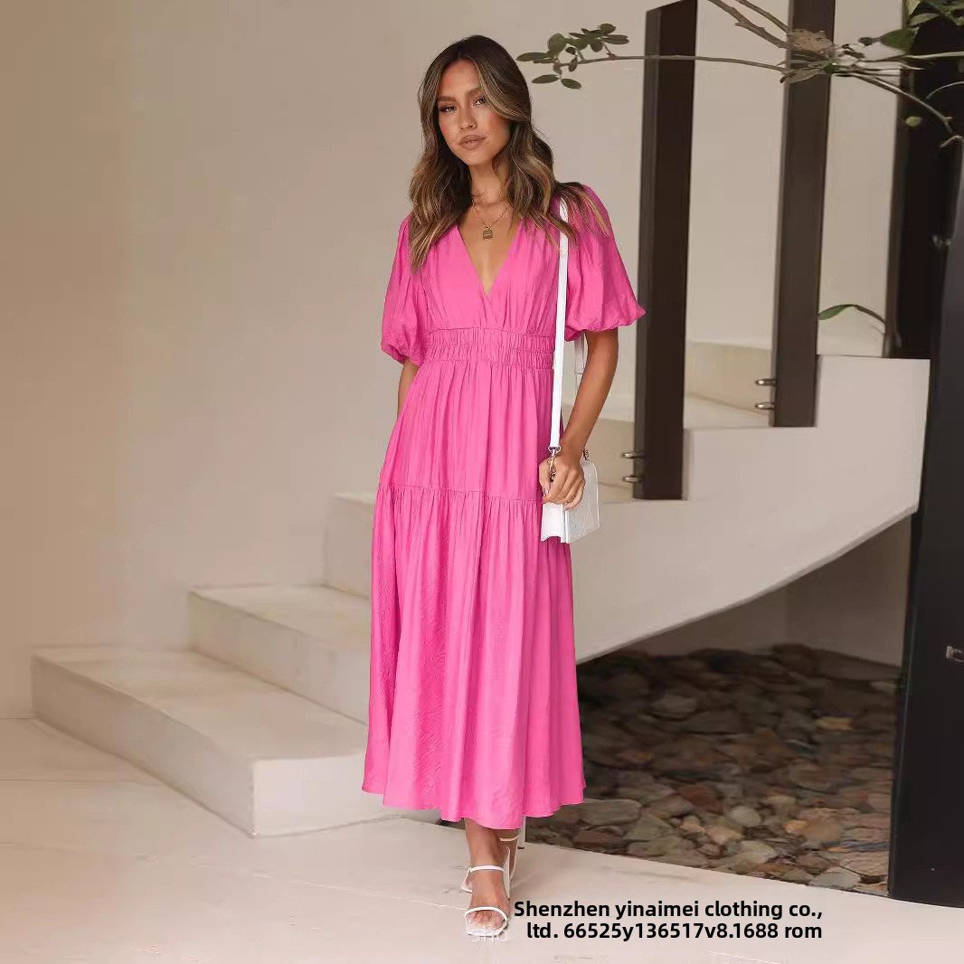Chic Deep V Puffed Sleeve Vacation Dress – Elegant Flowy Summer Maxi for Beach & Resort Wear.