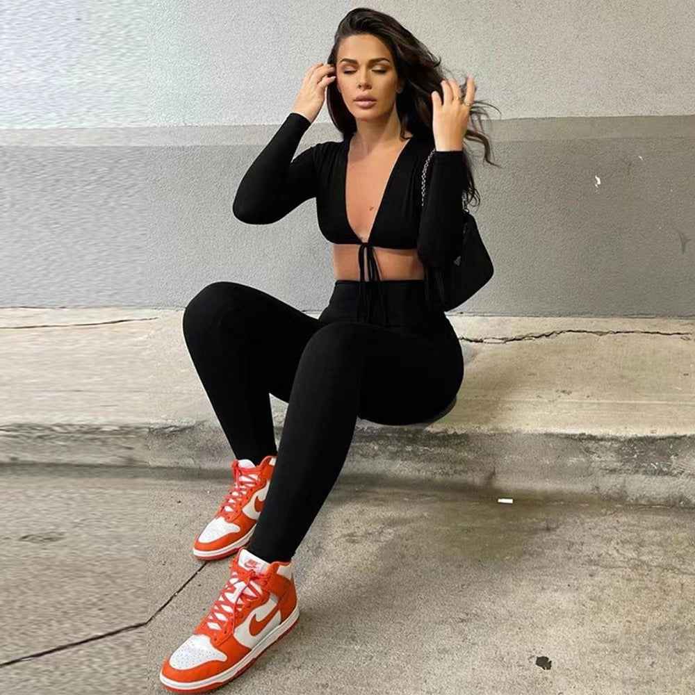 Women’s Sexy Lace-Up Hollow Crop Top & Slim-Fit Pants 2-Piece Set – Solid Color Fashion Outfit.