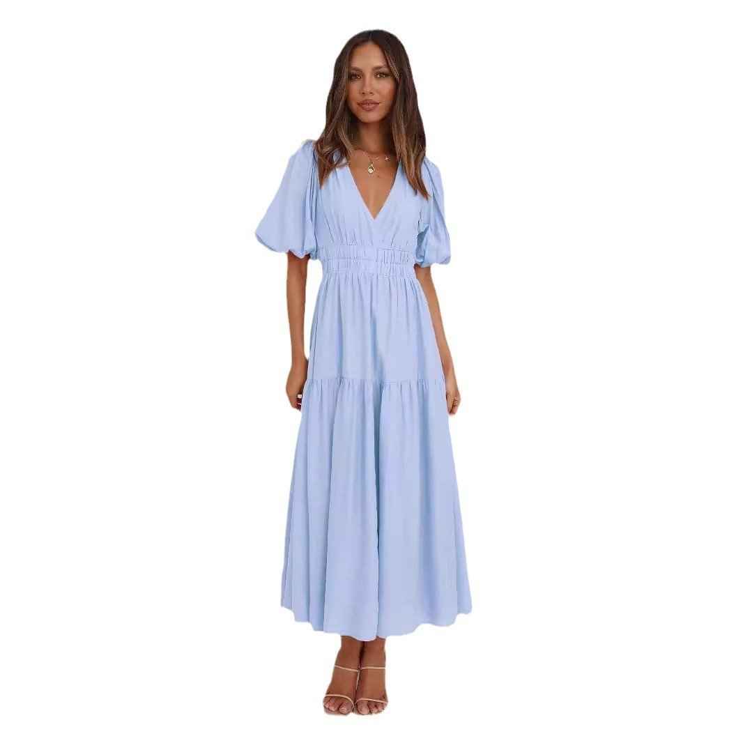 Chic Deep V Puffed Sleeve Vacation Dress – Elegant Flowy Summer Maxi for Beach & Resort Wear.